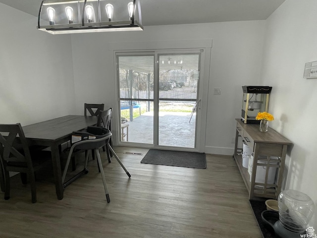 466 W 200 N, Logan, UT 84321 - dining room featuring baseboards and wood finished floors