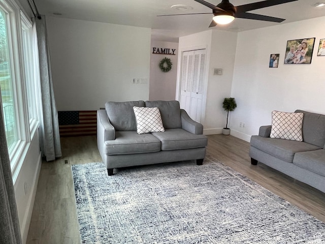 466 W 200 N, Logan, UT 84321 - living area featuring baseboards, wood finished floors, and a ceiling fan