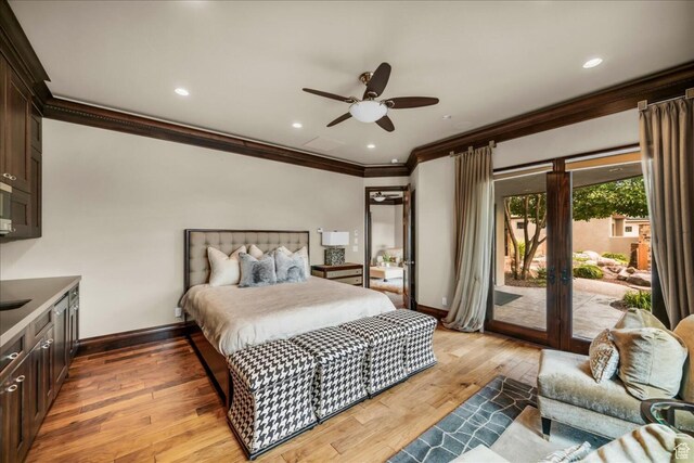 2196 W Long Sky Dr, St George, UT 84770 - bedroom featuring baseboards, access to exterior, and crown molding