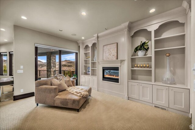 2196 W Long Sky Dr, St George, UT 84770 - living area with a glass covered fireplace, recessed lighting, carpet floors, visible vents, and built in shelves