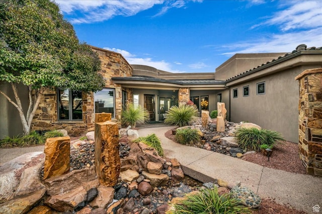 2196 W Long Sky Dr, St George, UT 84770 - doorway to property featuring stone siding and stucco siding