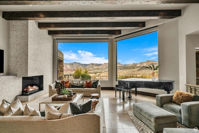 2196 W Long Sky Dr, St George, UT 84770 - living area with a mountain view, beamed ceiling, and a fireplace