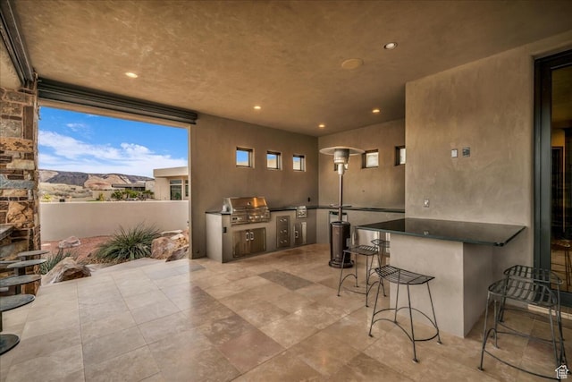 2196 W Long Sky Dr, St George, UT 84770 - view of patio featuring grilling area, outdoor wet bar, and area for grilling