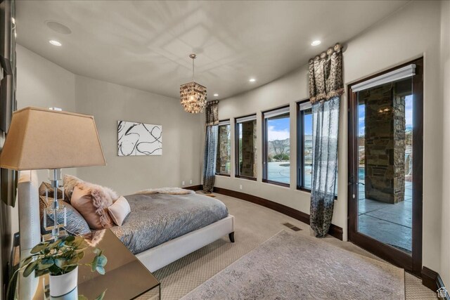 2196 W Long Sky Dr, St George, UT 84770 - carpeted bedroom featuring access to outside, baseboards, a chandelier, recessed lighting, and visible vents