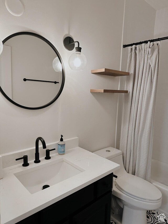 bathroom with toilet, vanity, and shower / bathtub combination with curtain