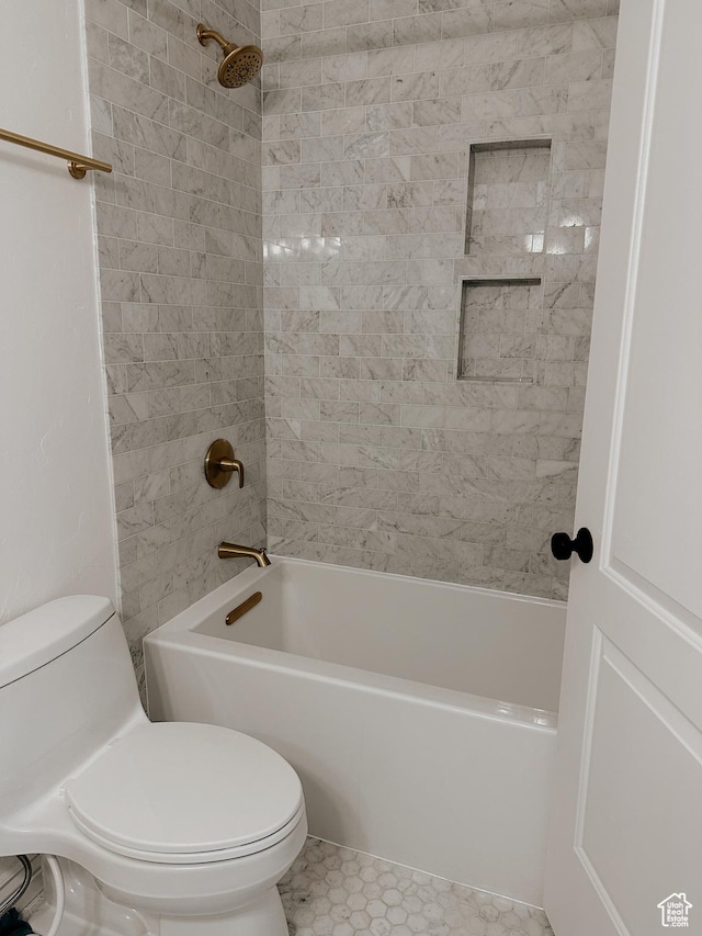 full bathroom with toilet and shower / bathtub combination