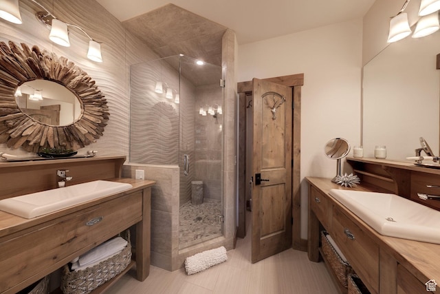 1261 N Main Rubicon Trl Unit M-14, Moab, UT 84532 - bathroom with a sink, a stall shower, and two vanities