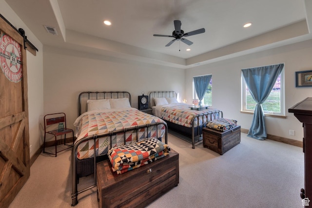 1261 N Main Rubicon Trl Unit M-14, Moab, UT 84532 - carpeted bedroom featuring recessed lighting, a tray ceiling, visible vents, and a barn door