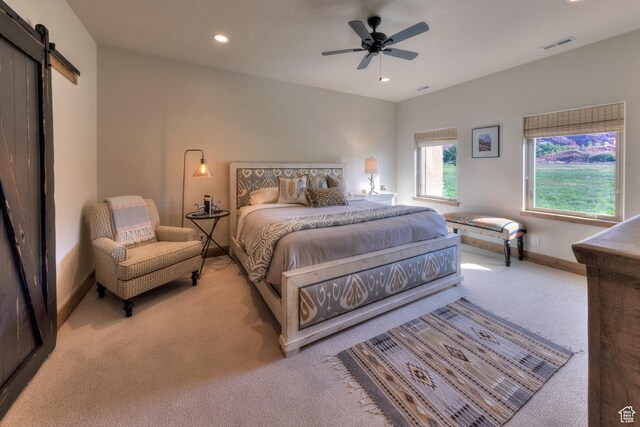 1261 N Main Rubicon Trl Unit M-14, Moab, UT 84532 - carpeted bedroom with visible vents, baseboards, recessed lighting, a barn door, and a ceiling fan