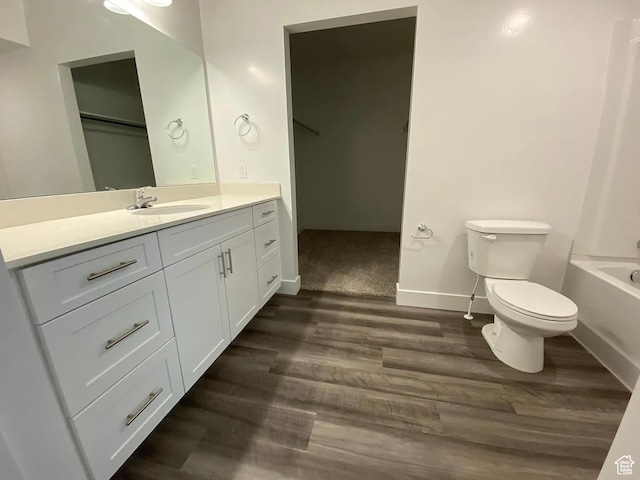 875 S Depot St Unit C212, Clearfield, UT 84015 - bathroom with vanity, toilet, a bath, and hardwood / wood-style flooring