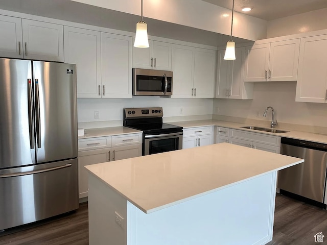 875 S Depot St Unit C212, Clearfield, UT 84015 - kitchen with appliances with stainless steel finishes, a center island, sink, and white cabinetry