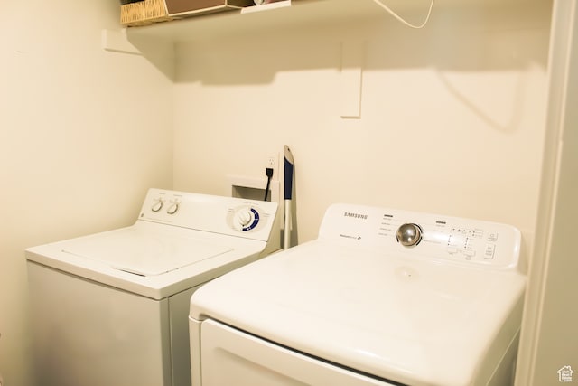 875 S Depot St Unit C212, Clearfield, UT 84015 - clothes washing area with separate washer and dryer