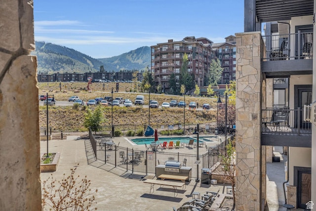 2669 Canyons Resort Dr Unit 206Abc, Park City, UT 84098 - exterior space with a community pool, a mountain view, and fence