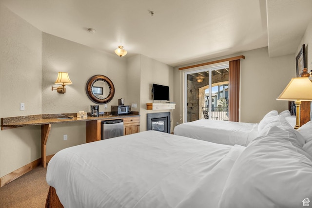 2669 Canyons Resort Dr Unit 206Abc, Park City, UT 84098 - bedroom with fridge, carpet, baseboards, access to exterior, and a glass covered fireplace