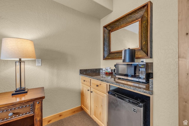2669 Canyons Resort Dr Unit 206Abc, Park City, UT 84098 - kitchen featuring stainless steel microwave, dishwasher, light brown cabinets, baseboards, and a textured wall