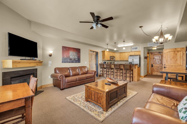 2669 Canyons Resort Dr Unit 206Abc, Park City, UT 84098 - living room featuring ceiling fan with notable chandelier, light carpet, a glass covered fireplace, and visible vents