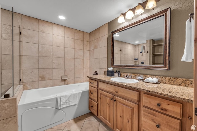 2669 Canyons Resort Dr Unit 206Abc, Park City, UT 84098 - bathroom with tile patterned floors, tile walls, vanity, and a garden tub