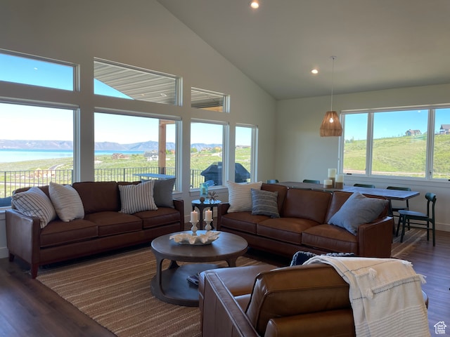 544 Lotus Dr, Fish Haven, ID 83287 - living room with a water and mountain view, dark wood-type flooring, and a healthy amount of sunlight