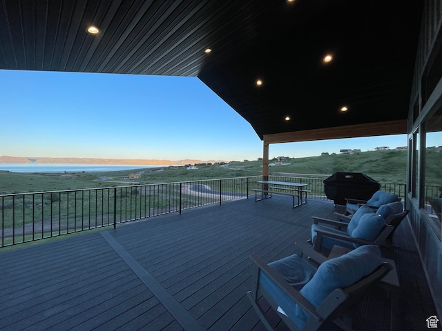 544 Lotus Dr, Fish Haven, ID 83287 - deck at dusk featuring area for grilling and a rural view