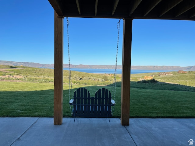 544 Lotus Dr, Fish Haven, ID 83287 - view of patio featuring a water and mountain view