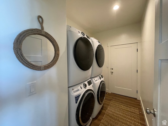 544 Lotus Dr, Fish Haven, ID 83287 - laundry room featuring stacked washing maching and dryer and dark wood-type flooring