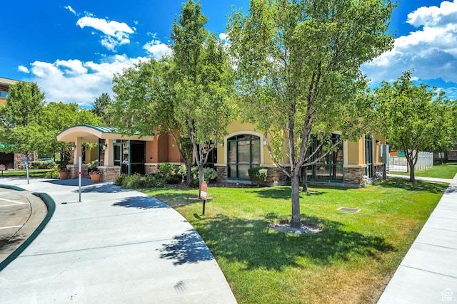 3478 S Cozy River Pl Unit 402, West Valley City, UT 84119 - surrounding community featuring a lawn