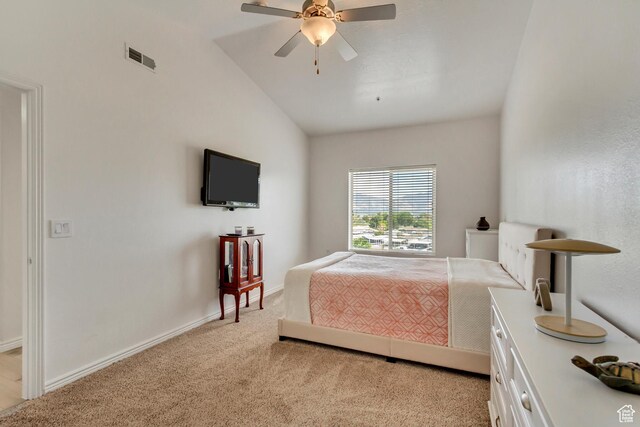 3478 S Cozy River Pl Unit 402, West Valley City, UT 84119 - bedroom featuring vaulted ceiling, baseboards, visible vents, a ceiling fan, and light carpet