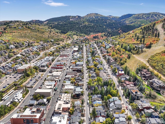 424 Park Ave Unit D, Park City, UT 84060 - aerial overview of property's location featuring a mountain backdrop and nearby suburban area