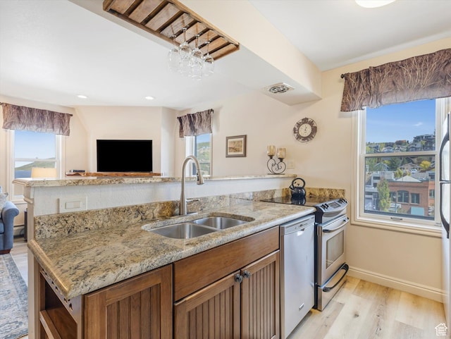 424 Park Ave Unit D, Park City, UT 84060 - kitchen featuring a sink, stainless steel dishwasher, light wood-style flooring, plenty of natural light, and recessed lighting