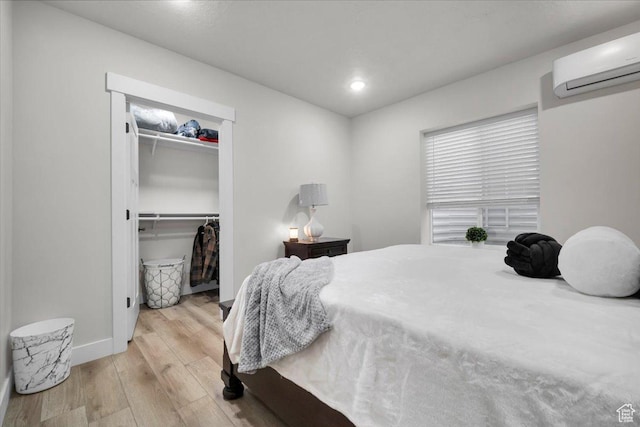 591 W 100 N, Payson, UT 84651 - bedroom with a wall mounted AC, baseboards, recessed lighting, a walk in closet, and wood finished floors