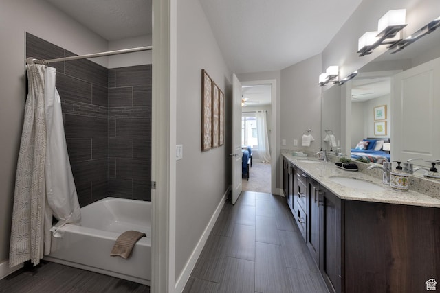 420 N 600 W, Moab, UT 84532 - bathroom with ensuite bathroom, baseboards, shower / bath combination with curtain, double vanity, and ceiling fan