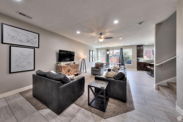 420 N 600 W, Moab, UT 84532 - living area with recessed lighting, a ceiling fan, baseboards, a textured ceiling, and stairway