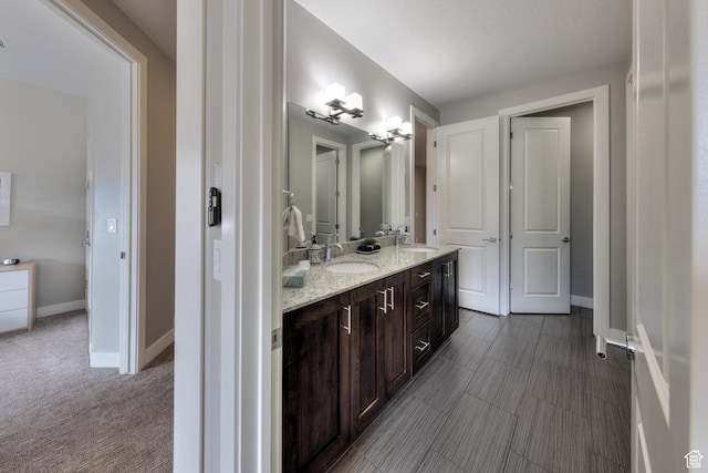 420 N 600 W, Moab, UT 84532 - bathroom featuring baseboards and double vanity