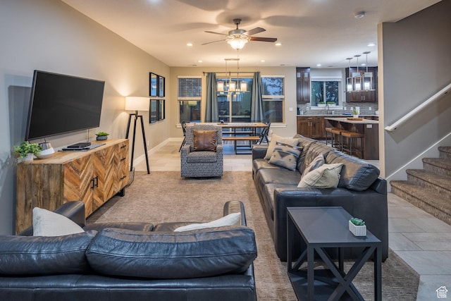 420 N 600 W, Moab, UT 84532 - living room featuring recessed lighting, a ceiling fan, stairway, a chandelier, and baseboards