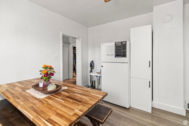 dining room with light wood-type flooring