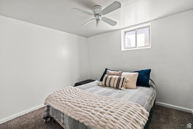 bedroom featuring baseboards, carpet flooring, and a ceiling fan