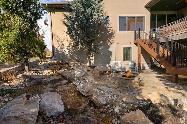 10575 S Alexander Park Ln, South Jordan, UT 84095 - exterior space with a patio, stucco siding, and stairs