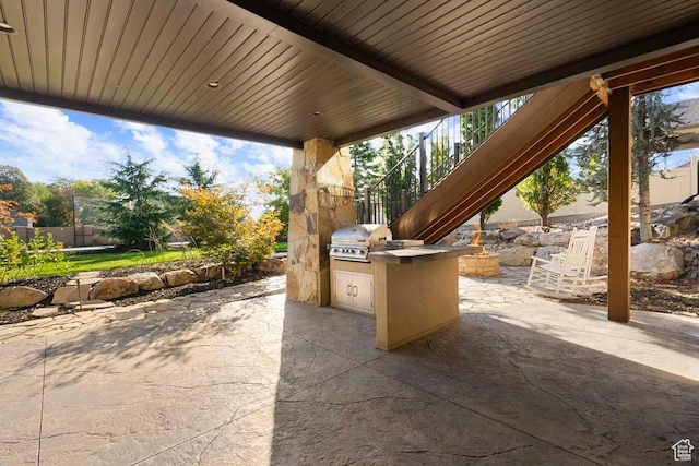 10575 S Alexander Park Ln, South Jordan, UT 84095 - view of patio featuring grilling area and exterior kitchen
