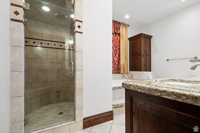 10575 S Alexander Park Ln, South Jordan, UT 84095 - full bathroom featuring a shower stall, tile patterned floors, a bath, and recessed lighting