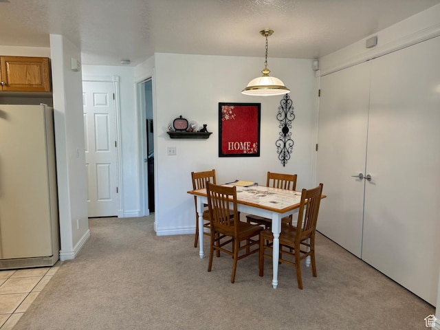 2480 W 450 S Unit 5, Springville, UT 84663 - dining area with light tile patterned floors, light carpet, and baseboards