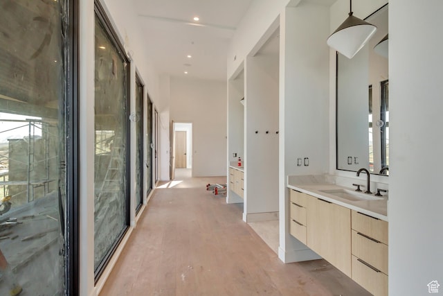 7165 Painted Valley Pass Unit 54, Park City, UT 84098 - bathroom featuring recessed lighting, wood finished floors, a healthy amount of sunlight, and vanity