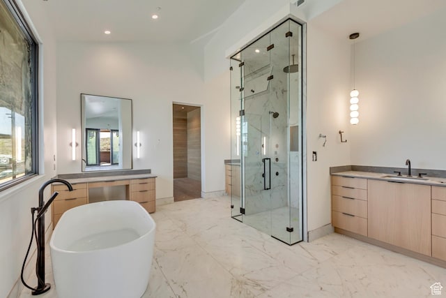 7165 Painted Valley Pass Unit 54, Park City, UT 84098 - bathroom with a marble finish shower, vanity, marble finish floor, a freestanding bath, and recessed lighting