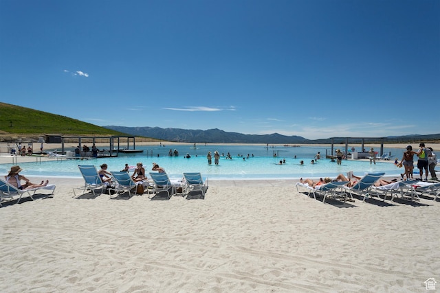 7165 Painted Valley Pass Unit 54, Park City, UT 84098 - view of pool with a water and mountain view and a beach view