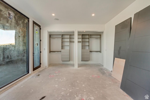 7165 Painted Valley Pass Unit 54, Park City, UT 84098 - unfurnished bedroom with recessed lighting, two closets, and unfinished concrete flooring