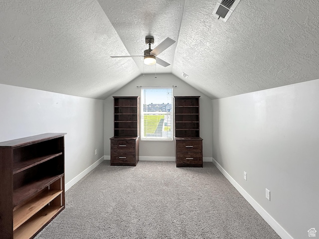 2142 W 3100 S, West Haven, UT 84401 - additional living space featuring carpet flooring, lofted ceiling, baseboards, visible vents, and ceiling fan