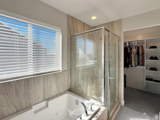 2142 W 3100 S, West Haven, UT 84401 - bathroom featuring a shower stall, a whirlpool tub, plenty of natural light, and a spacious closet