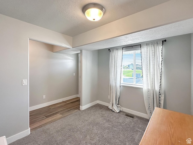 2142 W 3100 S, West Haven, UT 84401 - carpeted empty room featuring a textured ceiling, baseboards, and visible vents