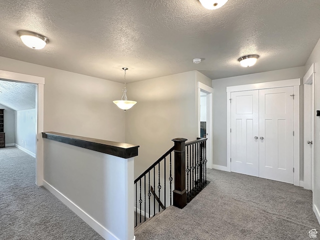 2142 W 3100 S, West Haven, UT 84401 - hall featuring baseboards, carpet flooring, and an upstairs landing
