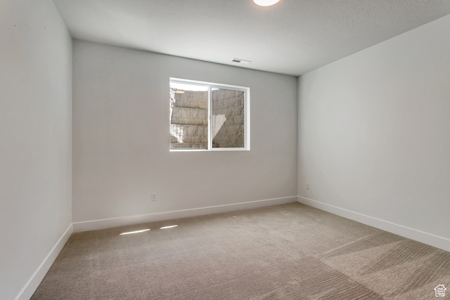 713 E 1500 N Unit 19, Orem, UT 84097 - carpeted empty room featuring a textured ceiling