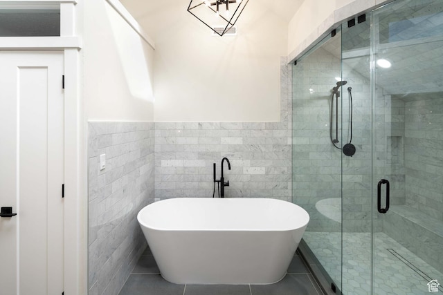 715 E 1700 N, Mapleton, UT 84664 - bathroom featuring a freestanding bath, tile walls, tile patterned flooring, a wainscoted wall, and a shower stall